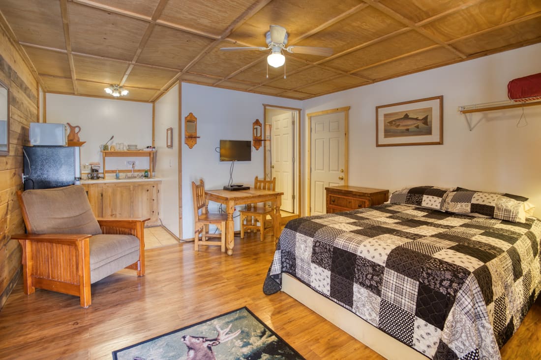 Spruce 1 cottage bedroom with knotty pine walls
