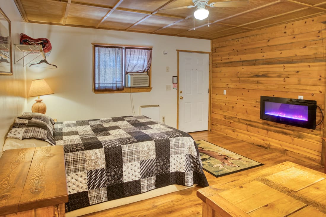 Spruce 1 cottage bed and window light near Rainbow Lake
